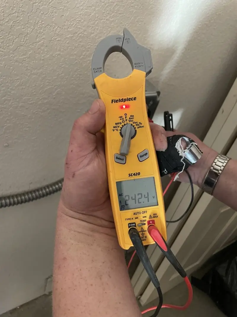 Voltage testing with clamp meter during Electrical Installation Services in Spring Valley